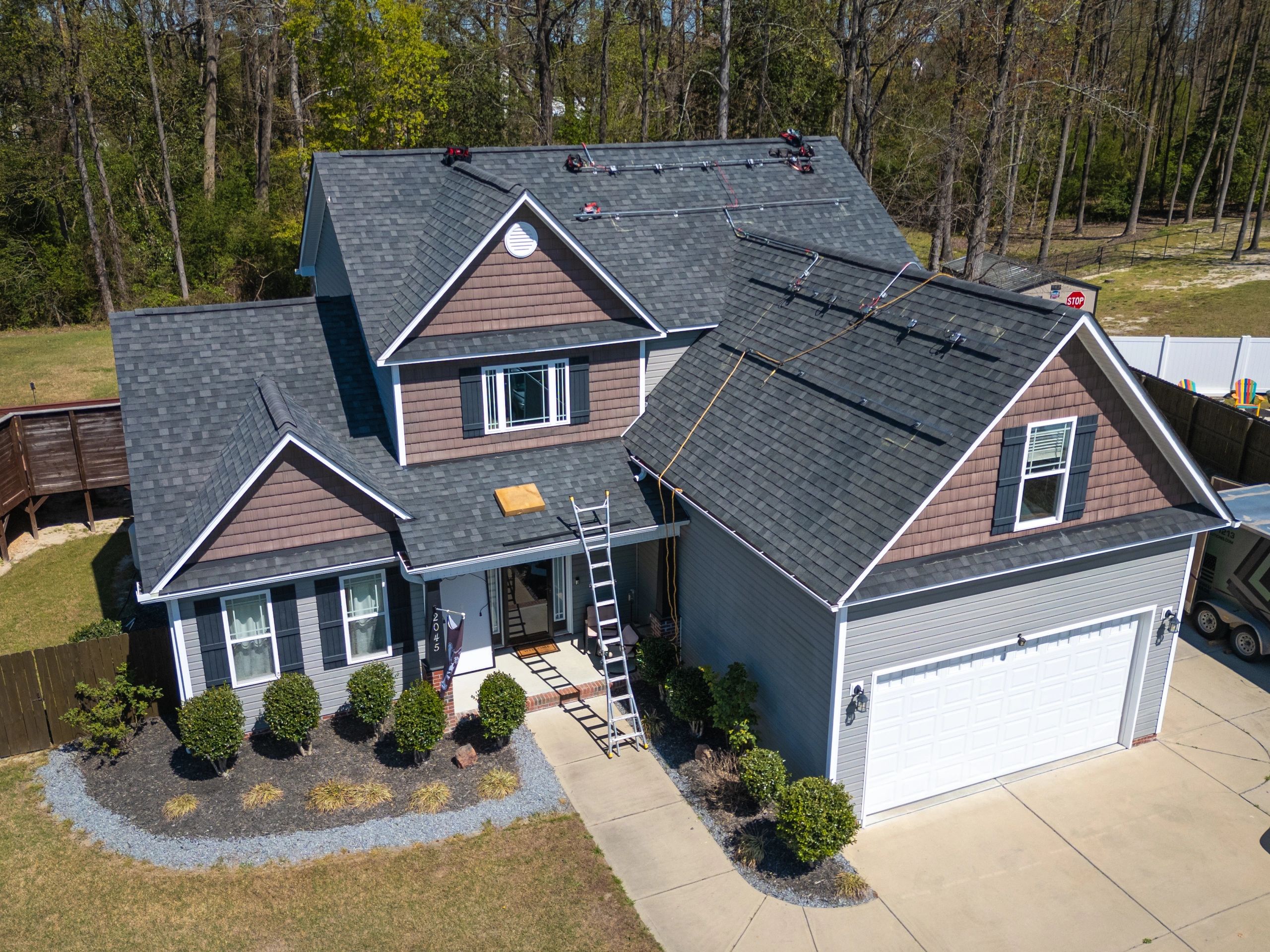 Premium residential roof installation with solar panels